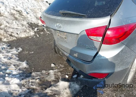 2013 Hyundai Tucson Limited z USA, uszkodzony, nr VIN KM8JU3AC2DU581403